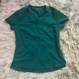 JAANUU one pocket tuck in top